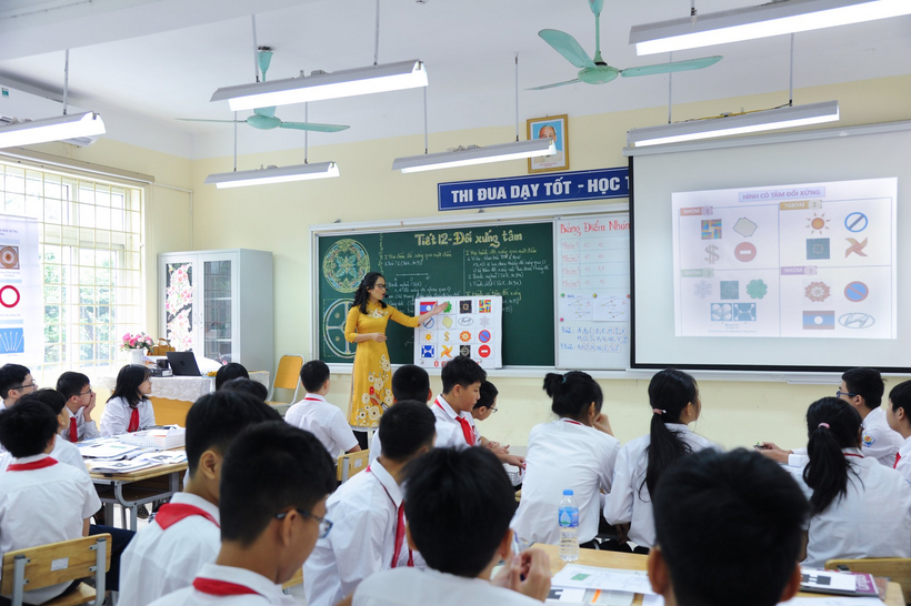 A picture containing text, person, indoor, ceilingDescription automatically generated