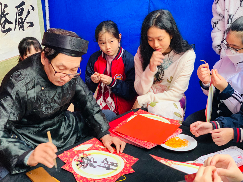 A group of people paintingDescription automatically generated with medium confidence