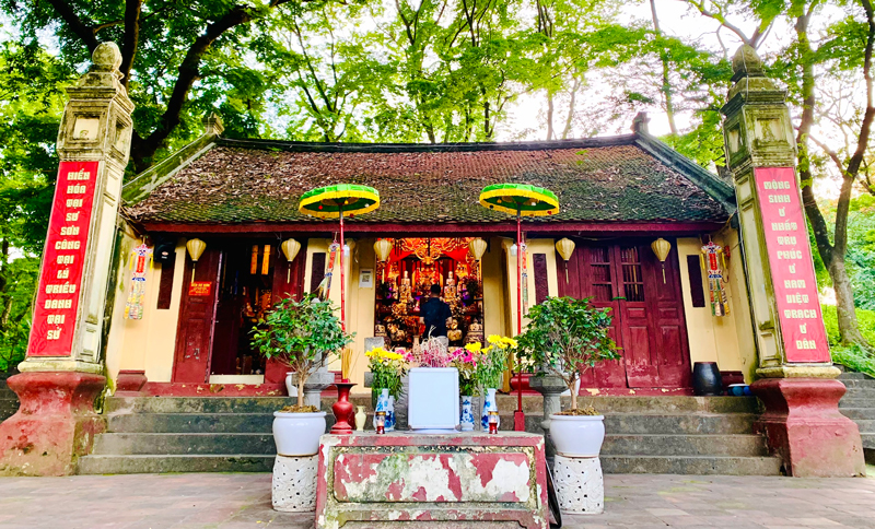 A picture containing text, tree, outdoorDescription automatically generated