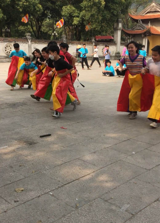 A group of people dancingDescription automatically generated with medium confidence