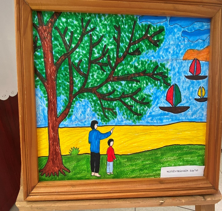 A framed painting of a person and a childDescription automatically generated with low confidence