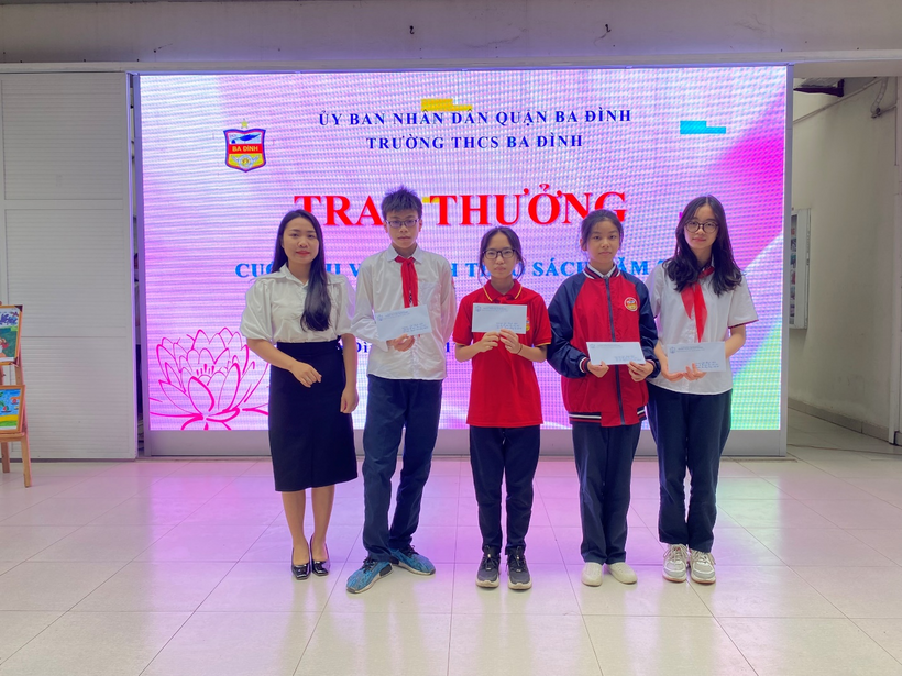 A group of people posing for a photoDescription automatically generated