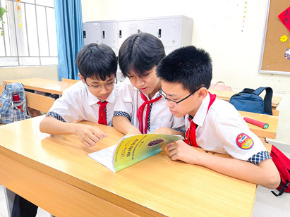 A picture containing text, child, child, tableDescription automatically generated