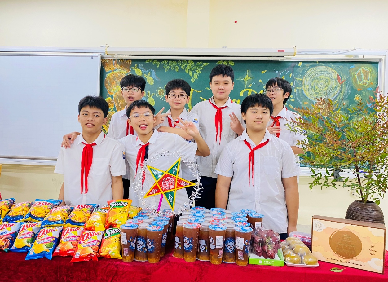 A group of boys in uniform standing in front of a table with food

AI-generated content may be incorrect.