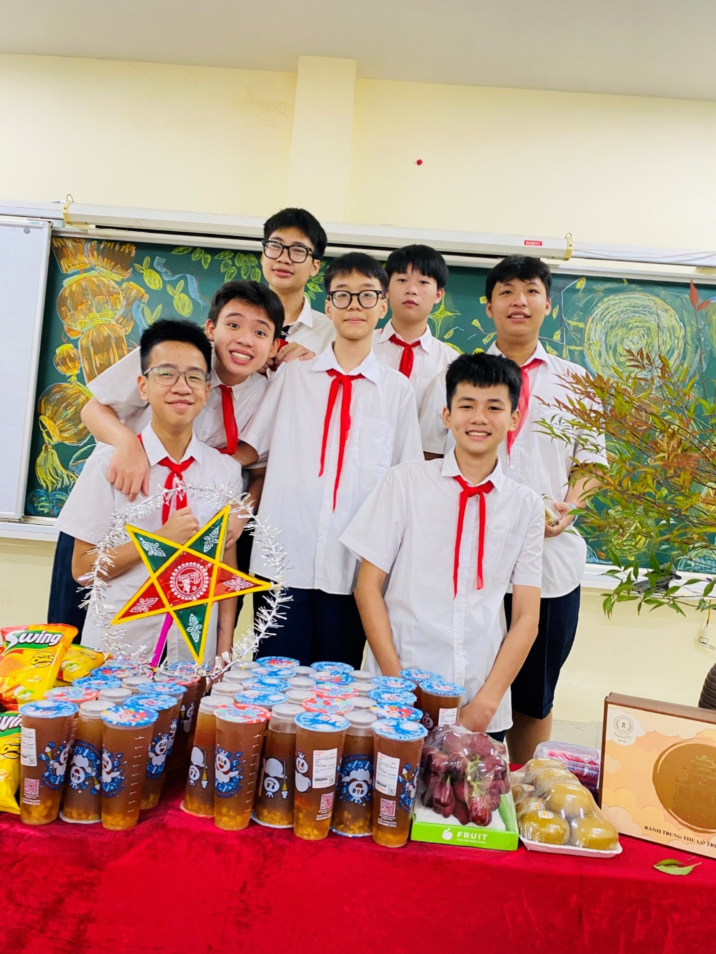 A group of boys standing in front of a table full of drinks

AI-generated content may be incorrect.